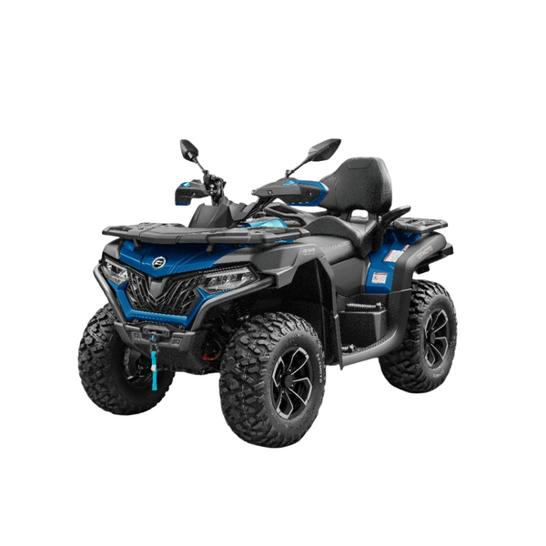 Blue and black ATV on a white background
