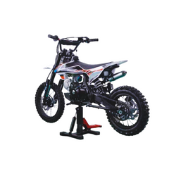 Children's dirt bike on a stand against a white background